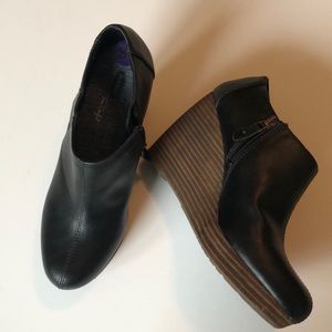 Stylish wedge bootie with extra lift.